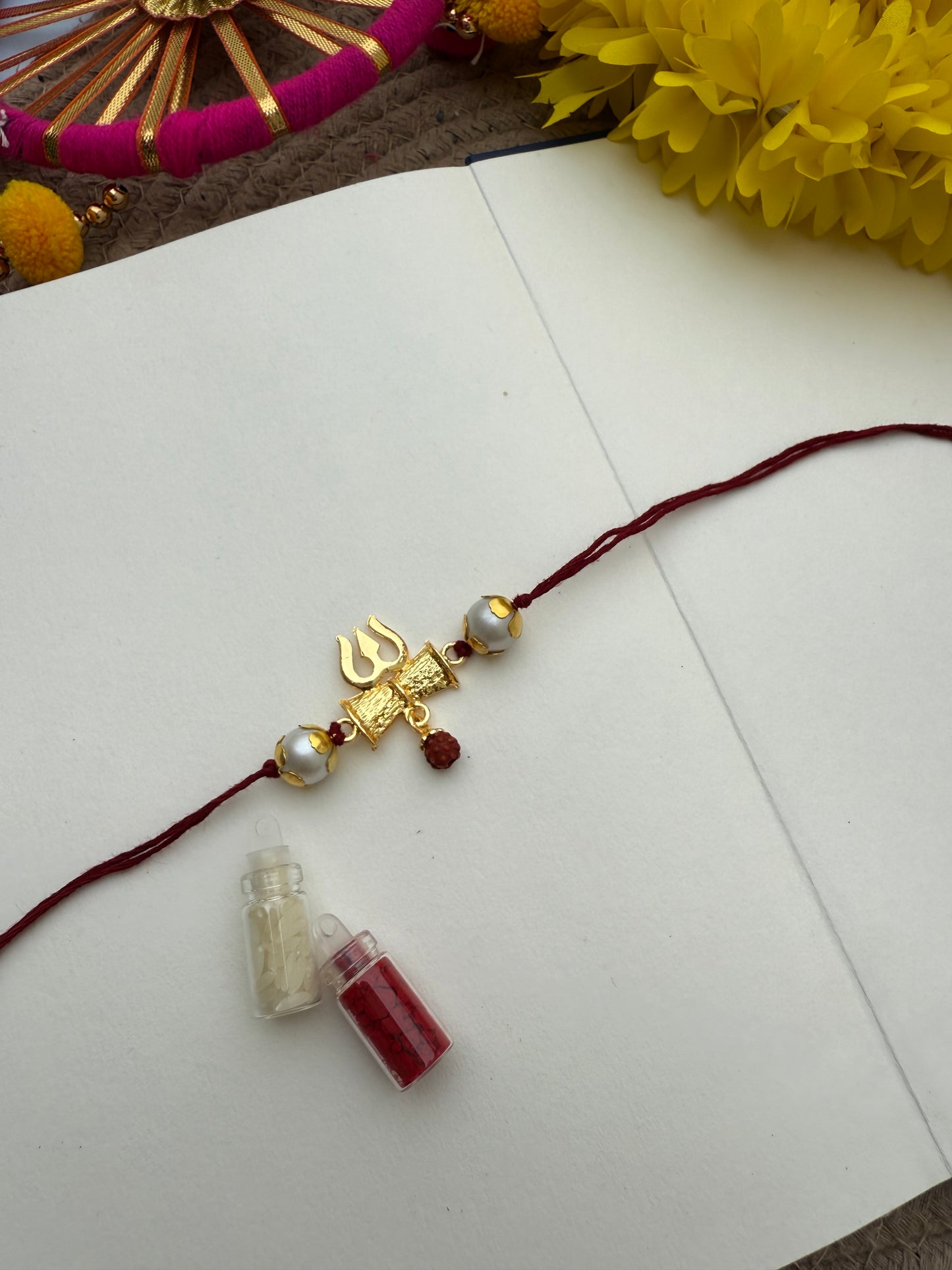 Om Trishul Rakhi by Elegantstyle