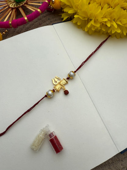 Om Trishul Rakhi by Elegantstyle