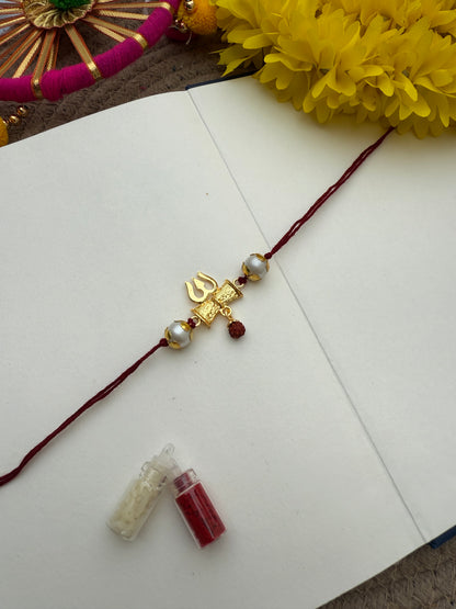 Om Trishul Rakhi by Elegantstyle
