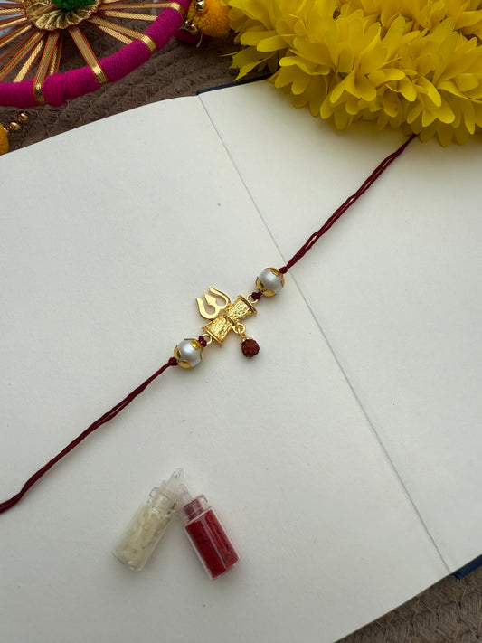 Om Trishul Rakhi by Elegantstyle
