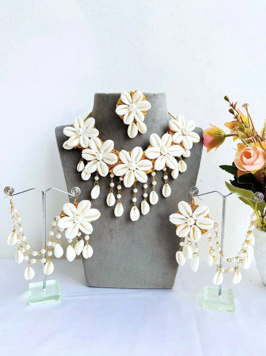 Haldi cowrie shall jewellery by elegant style