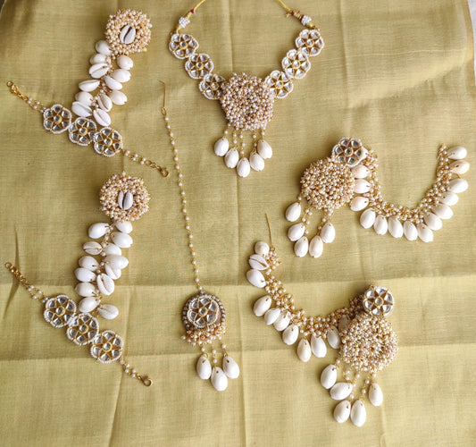 Cowrie shell Haldi jewellery set by elegant style